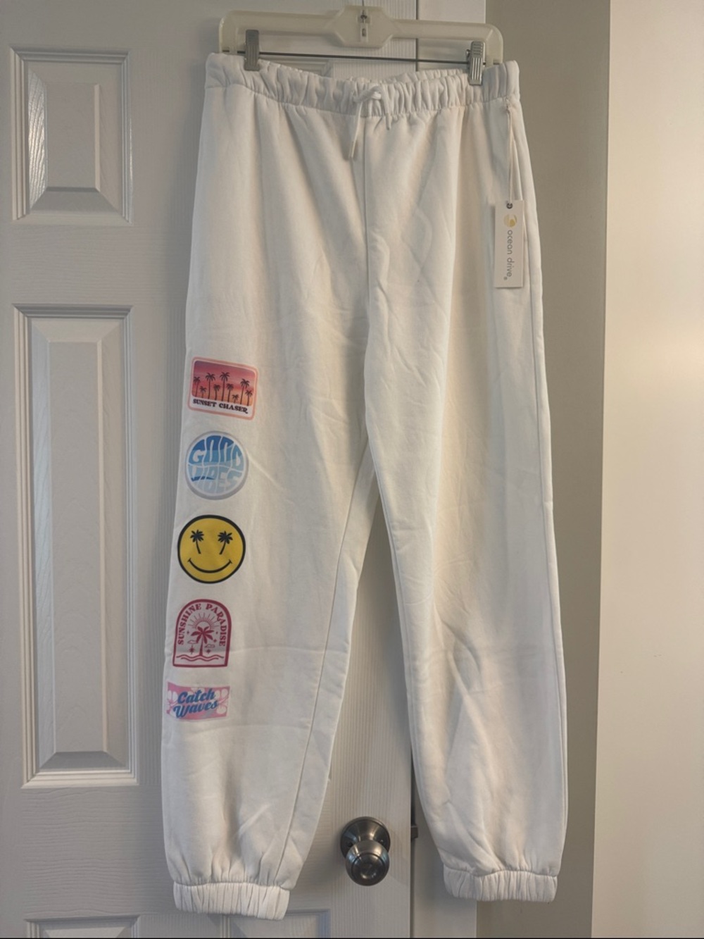 Ocean Drive White Jogger Sweatpants with Colorful Patch Graphics